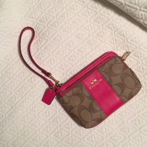 COACH pink lined wallet wristlet